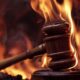 An image of a gavel on fire.