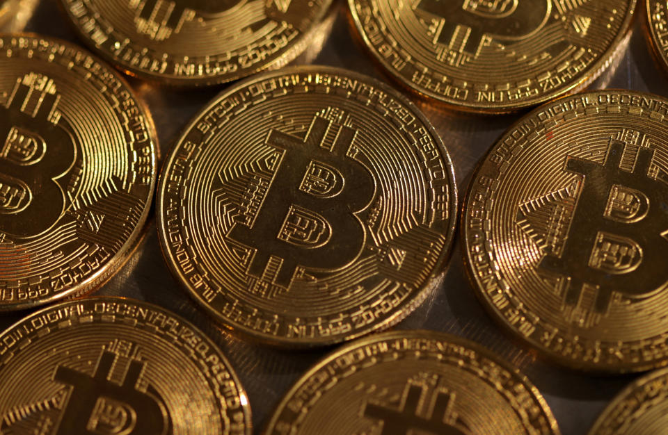 FILE PHOTO: Representations of the cryptocurrency Bitcoin are seen in this illustration, August 10, 2022. REUTERS/Dado Ruvic/Illustration/File Photo